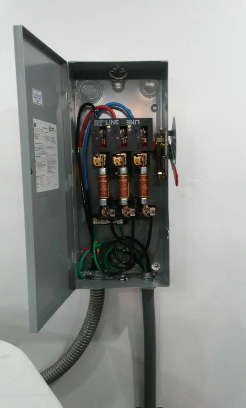 Three-phase disconnect switch installed for Smoke Detector Installation in Bondurant